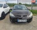 Черный Мазда 2, объемом двигателя 1.5 л и пробегом 185 тыс. км за 6800 $, фото 1 на Automoto.ua