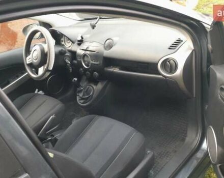 Черный Мазда 2, объемом двигателя 1.5 л и пробегом 226 тыс. км за 5500 $, фото 2 на Automoto.ua