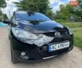 Черный Мазда 2, объемом двигателя 1.4 л и пробегом 233 тыс. км за 3599 $, фото 1 на Automoto.ua