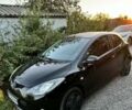 Черный Мазда 2, объемом двигателя 1.3 л и пробегом 180 тыс. км за 4000 $, фото 1 на Automoto.ua