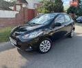 Чорний Мазда 2, об'ємом двигуна 1.5 л та пробігом 169 тис. км за 6500 $, фото 1 на Automoto.ua