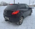 Чорний Мазда 2, об'ємом двигуна 1.4 л та пробігом 237 тис. км за 1777 $, фото 1 на Automoto.ua