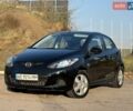 Чорний Мазда 2, об'ємом двигуна 1.4 л та пробігом 186 тис. км за 4999 $, фото 1 на Automoto.ua
