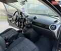 Чорний Мазда 2, об'ємом двигуна 1.4 л та пробігом 186 тис. км за 4999 $, фото 9 на Automoto.ua