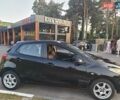 Черный Мазда 2, объемом двигателя 1.35 л и пробегом 128 тыс. км за 4800 $, фото 1 на Automoto.ua