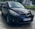 Чорний Мазда 2, об'ємом двигуна 1.5 л та пробігом 146 тис. км за 5100 $, фото 1 на Automoto.ua