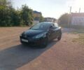 Чорний Мазда 2, об'ємом двигуна 1.3 л та пробігом 124 тис. км за 4300 $, фото 1 на Automoto.ua