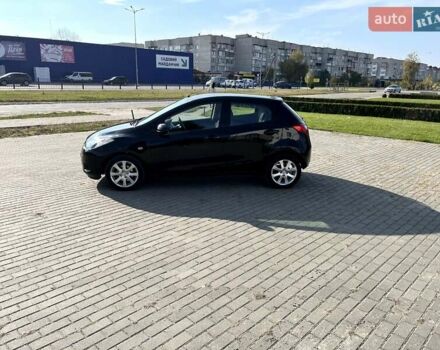 Чорний Мазда 2, об'ємом двигуна 1.5 л та пробігом 231 тис. км за 7250 $, фото 17 на Automoto.ua