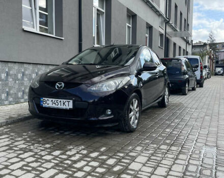 Черный Мазда 2, объемом двигателя 1.5 л и пробегом 145 тыс. км за 5750 $, фото 2 на Automoto.ua