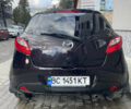 Черный Мазда 2, объемом двигателя 1.5 л и пробегом 145 тыс. км за 5750 $, фото 5 на Automoto.ua
