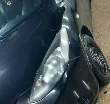 Черный Мазда 2, объемом двигателя 1.3 л и пробегом 212 тыс. км за 4800 $, фото 25 на Automoto.ua