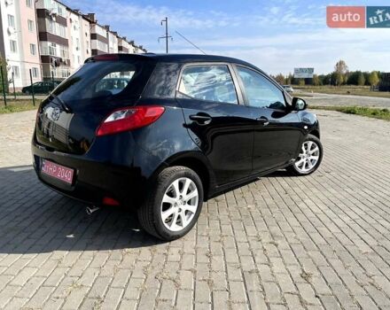 Чорний Мазда 2, об'ємом двигуна 1.5 л та пробігом 231 тис. км за 7250 $, фото 4 на Automoto.ua