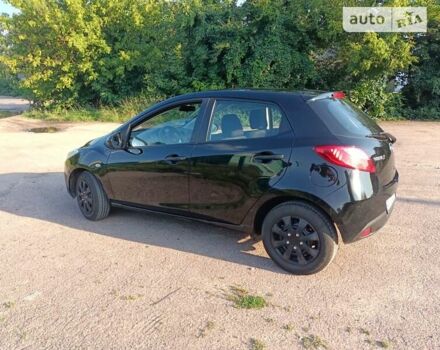 Чорний Мазда 2, об'ємом двигуна 1.3 л та пробігом 124 тис. км за 4300 $, фото 6 на Automoto.ua