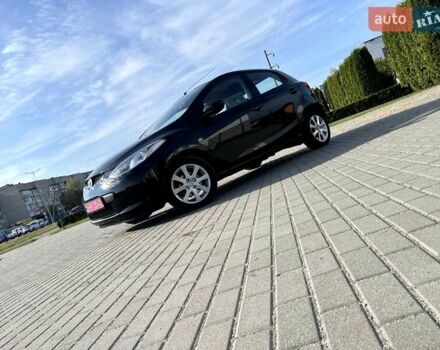 Черный Мазда 2, объемом двигателя 1.5 л и пробегом 231 тыс. км за 6750 $, фото 2 на Automoto.ua