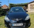 Чорний Мазда 2, об'ємом двигуна 1.35 л та пробігом 244 тис. км за 4900 $, фото 1 на Automoto.ua