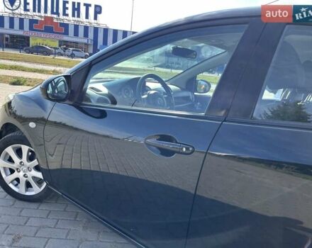 Чорний Мазда 2, об'ємом двигуна 1.5 л та пробігом 231 тис. км за 7250 $, фото 12 на Automoto.ua