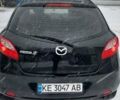 Черный Мазда 2, объемом двигателя 1.3 л и пробегом 212 тыс. км за 4800 $, фото 1 на Automoto.ua