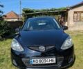 Чорний Мазда 2, об'ємом двигуна 1.35 л та пробігом 244 тис. км за 4800 $, фото 1 на Automoto.ua