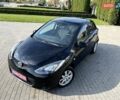 Чорний Мазда 2, об'ємом двигуна 1.5 л та пробігом 231 тис. км за 7250 $, фото 1 на Automoto.ua