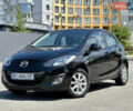 Чорний Мазда 2, об'ємом двигуна 1.35 л та пробігом 220 тис. км за 6111 $, фото 1 на Automoto.ua