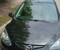 Чорний Мазда 2, об'ємом двигуна 1.3 л та пробігом 114 тис. км за 5900 $, фото 1 на Automoto.ua