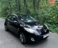 Черный Мазда 2, объемом двигателя 1.35 л и пробегом 191 тыс. км за 6000 $, фото 1 на Automoto.ua