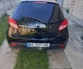 Черный Мазда 2, объемом двигателя 1.5 л и пробегом 200 тыс. км за 4508 $, фото 3 на Automoto.ua