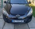 Черный Мазда 2, объемом двигателя 1.5 л и пробегом 200 тыс. км за 5000 $, фото 1 на Automoto.ua