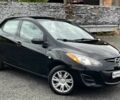 Черный Мазда 2, объемом двигателя 1.5 л и пробегом 83 тыс. км за 7728 $, фото 1 на Automoto.ua