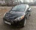 Черный Мазда 2, объемом двигателя 1.5 л и пробегом 208 тыс. км за 5700 $, фото 1 на Automoto.ua