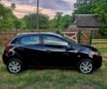 Черный Мазда 2, объемом двигателя 1.5 л и пробегом 185 тыс. км за 7200 $, фото 5 на Automoto.ua