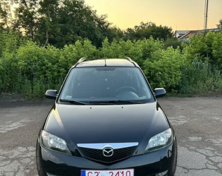 Чорний Мазда 2, об'ємом двигуна 1.4 л та пробігом 260 тис. км за 1600 $, фото 1 на Automoto.ua