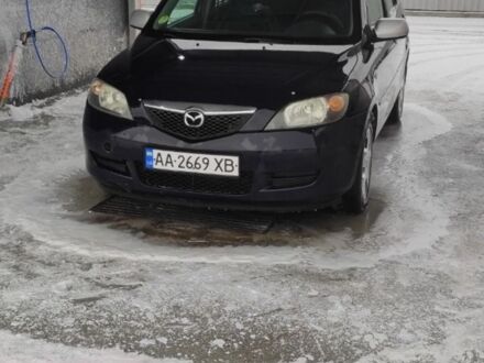 Чорний Мазда 2, об'ємом двигуна 1.4 л та пробігом 262 тис. км за 4425 $, фото 1 на Automoto.ua