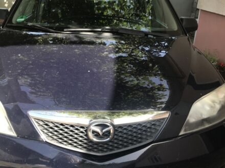 Чорний Мазда 2, об'ємом двигуна 1.2 л та пробігом 210 тис. км за 3600 $, фото 1 на Automoto.ua