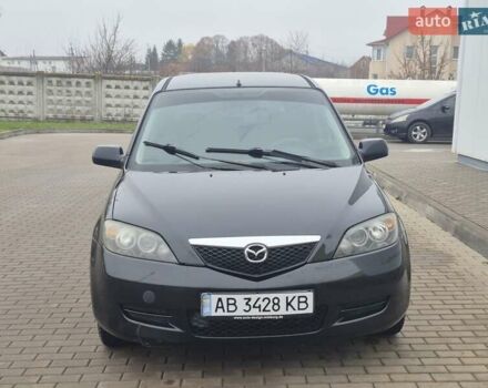 Черный Мазда 2, объемом двигателя 1.39 л и пробегом 240 тыс. км за 3500 $, фото 1 на Automoto.ua