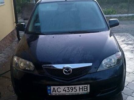 Чорний Мазда 2, об'ємом двигуна 1.4 л та пробігом 237 тис. км за 4300 $, фото 1 на Automoto.ua