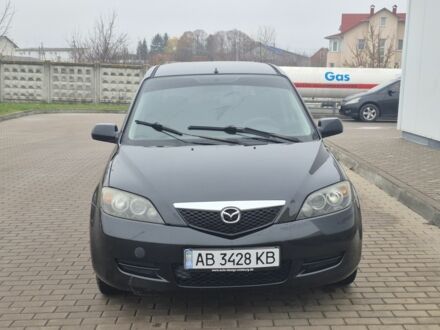 Черный Мазда 2, объемом двигателя 1.4 л и пробегом 240 тыс. км за 3500 $, фото 1 на Automoto.ua