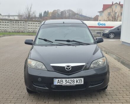 Черный Мазда 2, объемом двигателя 1.4 л и пробегом 240 тыс. км за 3500 $, фото 1 на Automoto.ua