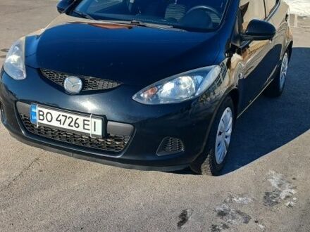 Черный Мазда 2, объемом двигателя 1.3 л и пробегом 260 тыс. км за 4450 $, фото 1 на Automoto.ua