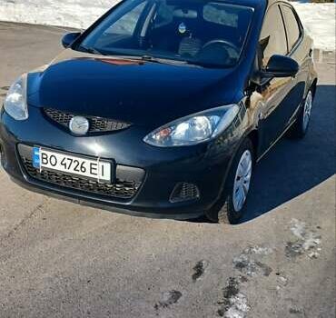 Черный Мазда 2, объемом двигателя 1.35 л и пробегом 260 тыс. км за 4450 $, фото 1 на Automoto.ua