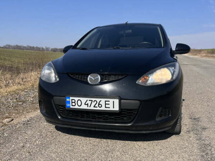 Черный Мазда 2, объемом двигателя 1.3 л и пробегом 250 тыс. км за 4200 $, фото 1 на Automoto.ua
