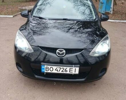 Черный Мазда 2, объемом двигателя 1.3 л и пробегом 260 тыс. км за 4100 $, фото 1 на Automoto.ua