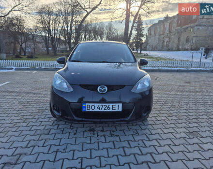 Черный Мазда 2, объемом двигателя 1.35 л и пробегом 233 тыс. км за 5300 $, фото 1 на Automoto.ua