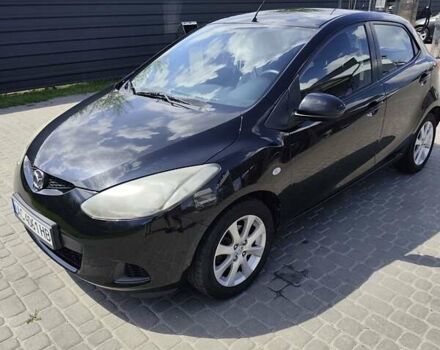 Черный Мазда 2, объемом двигателя 1.4 л и пробегом 178 тыс. км за 5200 $, фото 1 на Automoto.ua
