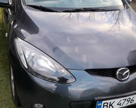 Черный Мазда 2, объемом двигателя 1.5 л и пробегом 226 тыс. км за 5500 $, фото 1 на Automoto.ua