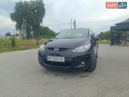 Черный Мазда 2, объемом двигателя 1.4 л и пробегом 195 тыс. км за 4900 $, фото 1 на Automoto.ua