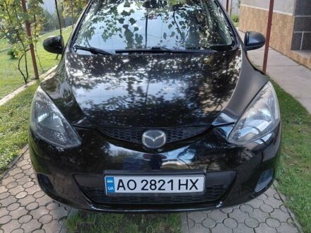 Черный Мазда 2, объемом двигателя 1.4 л и пробегом 300 тыс. км за 3700 $, фото 1 на Automoto.ua