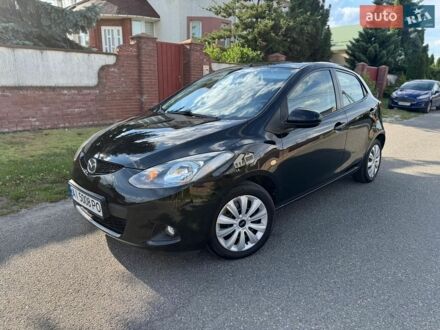 Чорний Мазда 2, об'ємом двигуна 1.5 л та пробігом 169 тис. км за 6500 $, фото 1 на Automoto.ua
