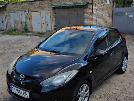 Чорний Мазда 2, об'ємом двигуна 1.5 л та пробігом 156 тис. км за 5300 $, фото 1 на Automoto.ua