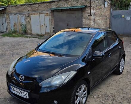 Черный Мазда 2, объемом двигателя 1.5 л и пробегом 156 тыс. км за 5300 $, фото 1 на Automoto.ua